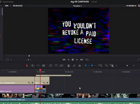 Davinci Resolve timeline. The preview shows a title card with text 'You wouldnt revoke a paid license' in the You wouldnt download a car font style.