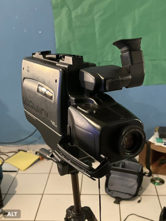 Image of a Magnavox EasyCam vhs camcorder on a tripod.