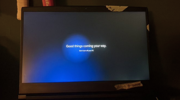 A laptop displaying Windows 11 finalizing configuration proccess with the words 'Good things coming your way. Dont turn off your PC'.